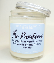 Load image into Gallery viewer, The Pandemic candle has a pastel blue label and says The Saltine Candle Company. The description on it says the only place you'll be flying this year is off the fucking handle. It says it smells like tropical fruit and coconut.