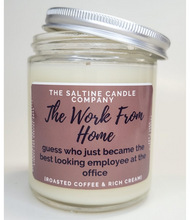 Load image into Gallery viewer, There is a brown candle called The Work From Home. In a glass jar with a aluminum lid. The label says guess who just became the best looking employee at the office. It says it smells like roasted coffee and rich cream.